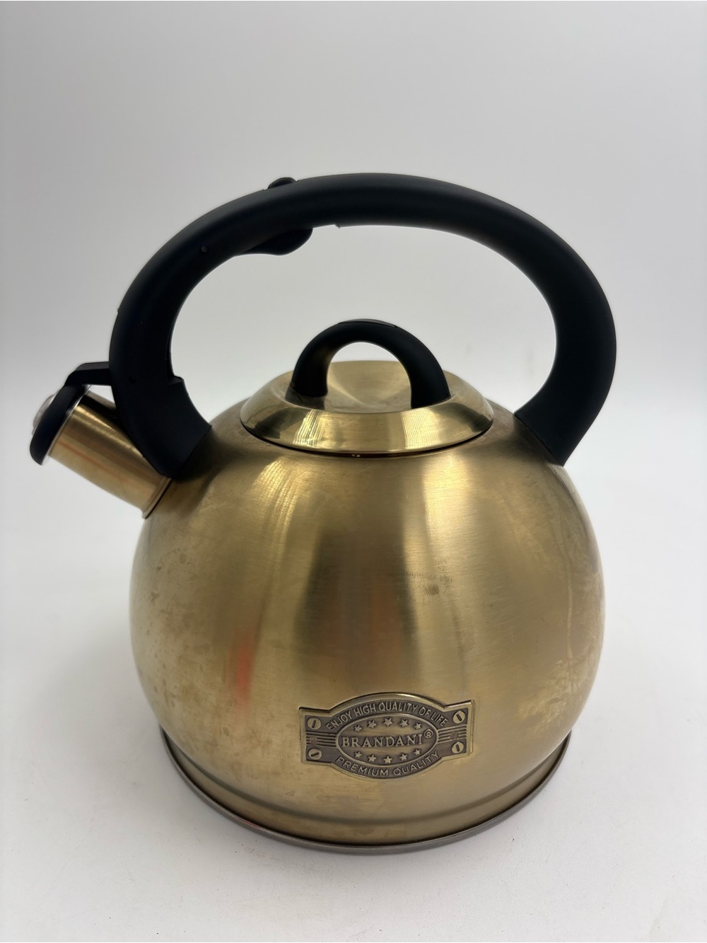 BRANDANI Gold-Colored Whistling Tea Kettle with Black Handle